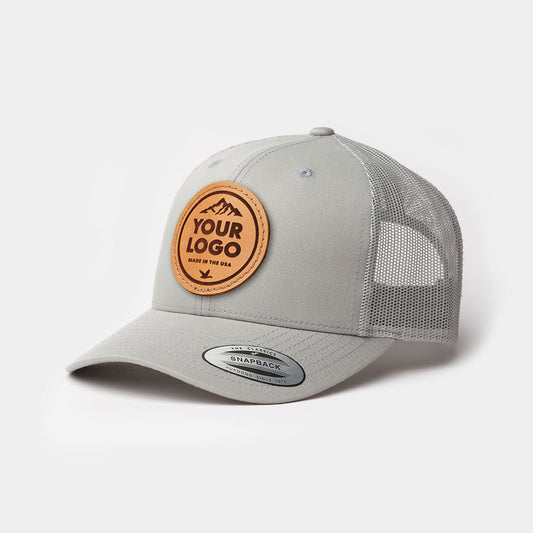 6606-LP Yupoong Leather Patch Trucker Cap